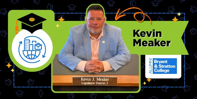 A man in a light blue jacket sits at a desk with a nameplate reading “Kevin J. Meaker, Legislative District 2.” Text reads “Kevin Meaker,” with Bryant & Stratton College alumni mentioned. Graduation icons decorate the image.